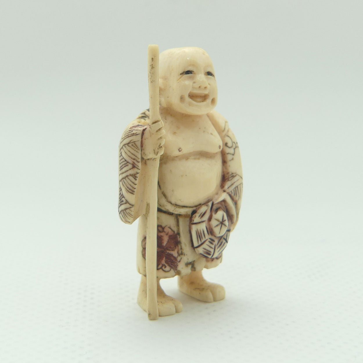 Japanese Carved Ivory Netsuke | Hotei with Staff | signed