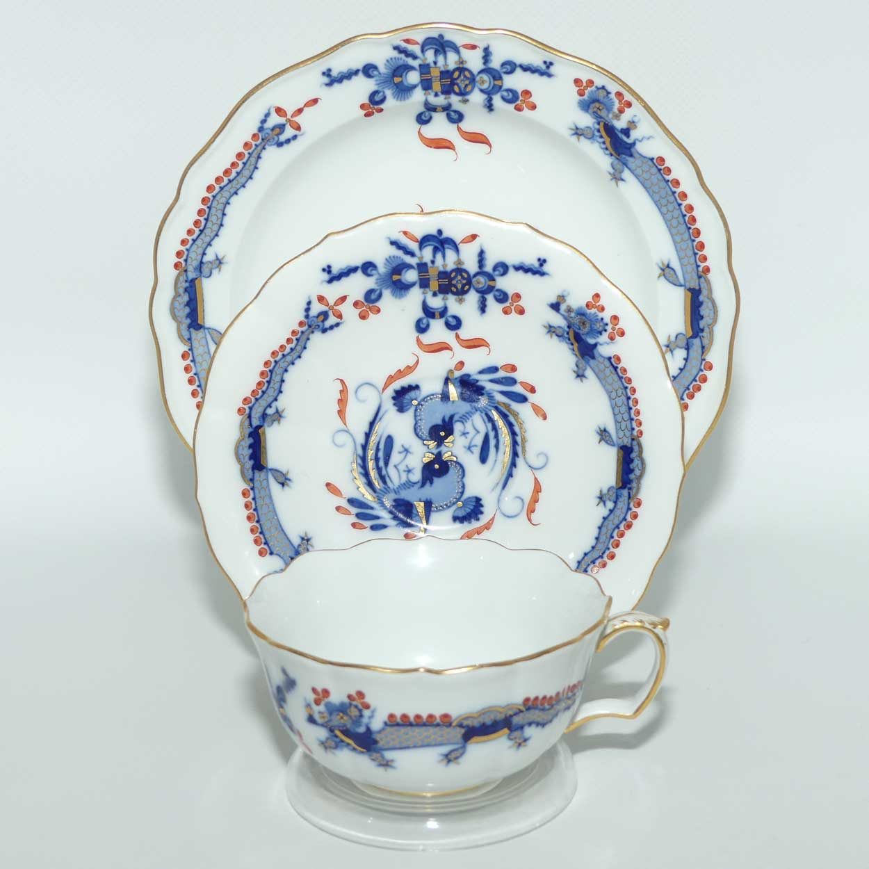 Meissen Blue Dragon with Red Highlights tea trio trimmed with gilt