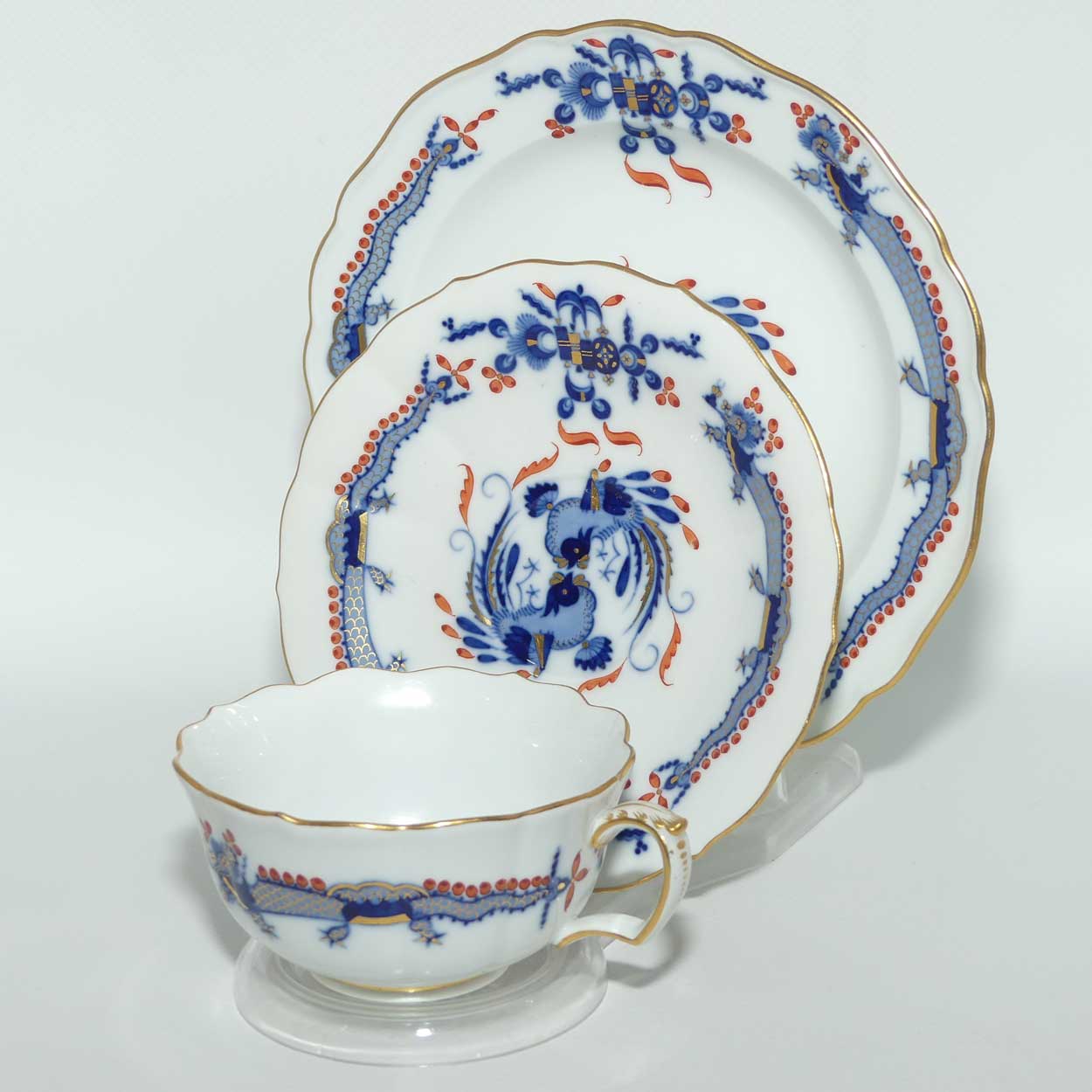 Meissen Blue Dragon with Red Highlights tea trio trimmed with gilt