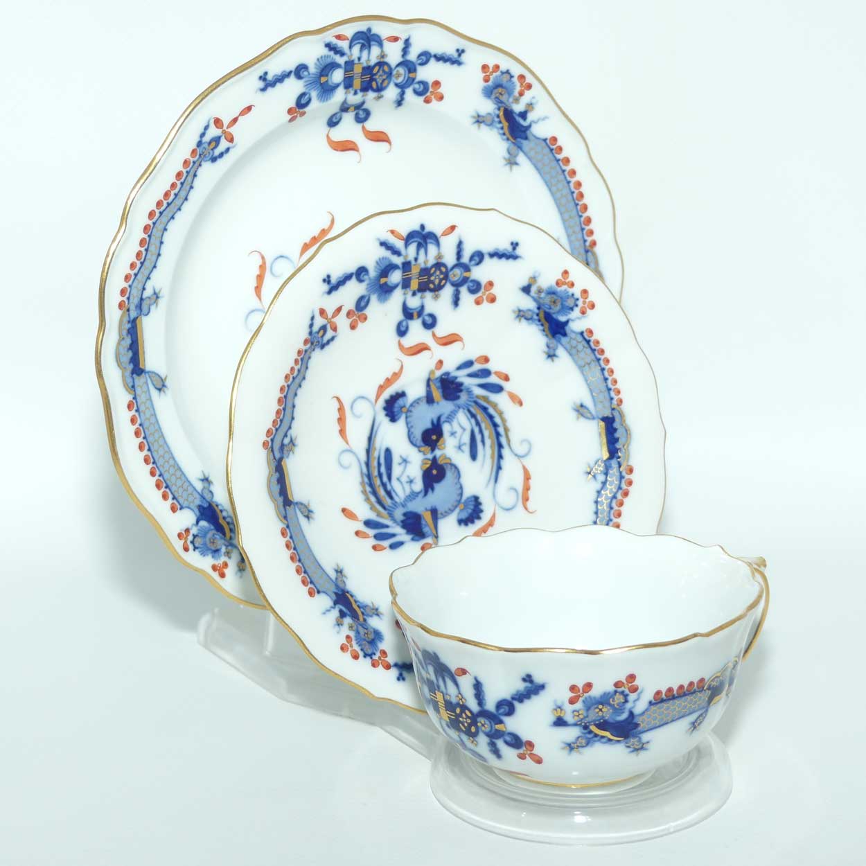 Meissen Blue Dragon with Red Highlights tea trio trimmed with gilt