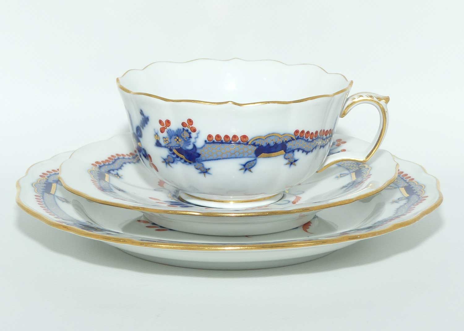 Meissen Blue Dragon with Red Highlights tea trio trimmed with gilt