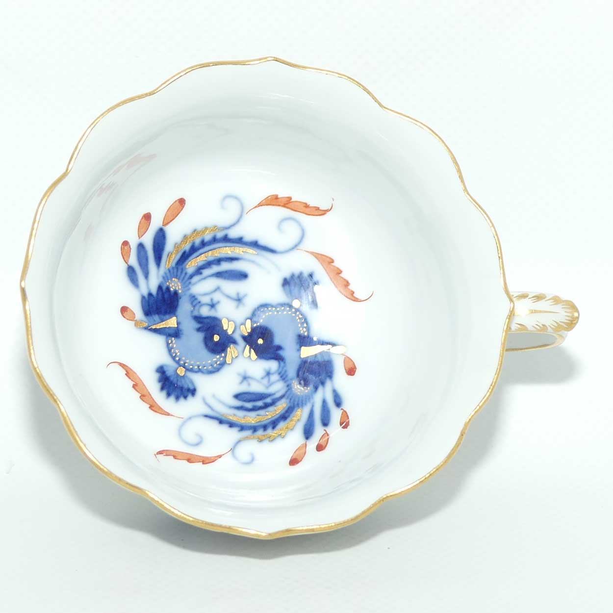 Meissen Blue Dragon with Red Highlights tea trio trimmed with gilt
