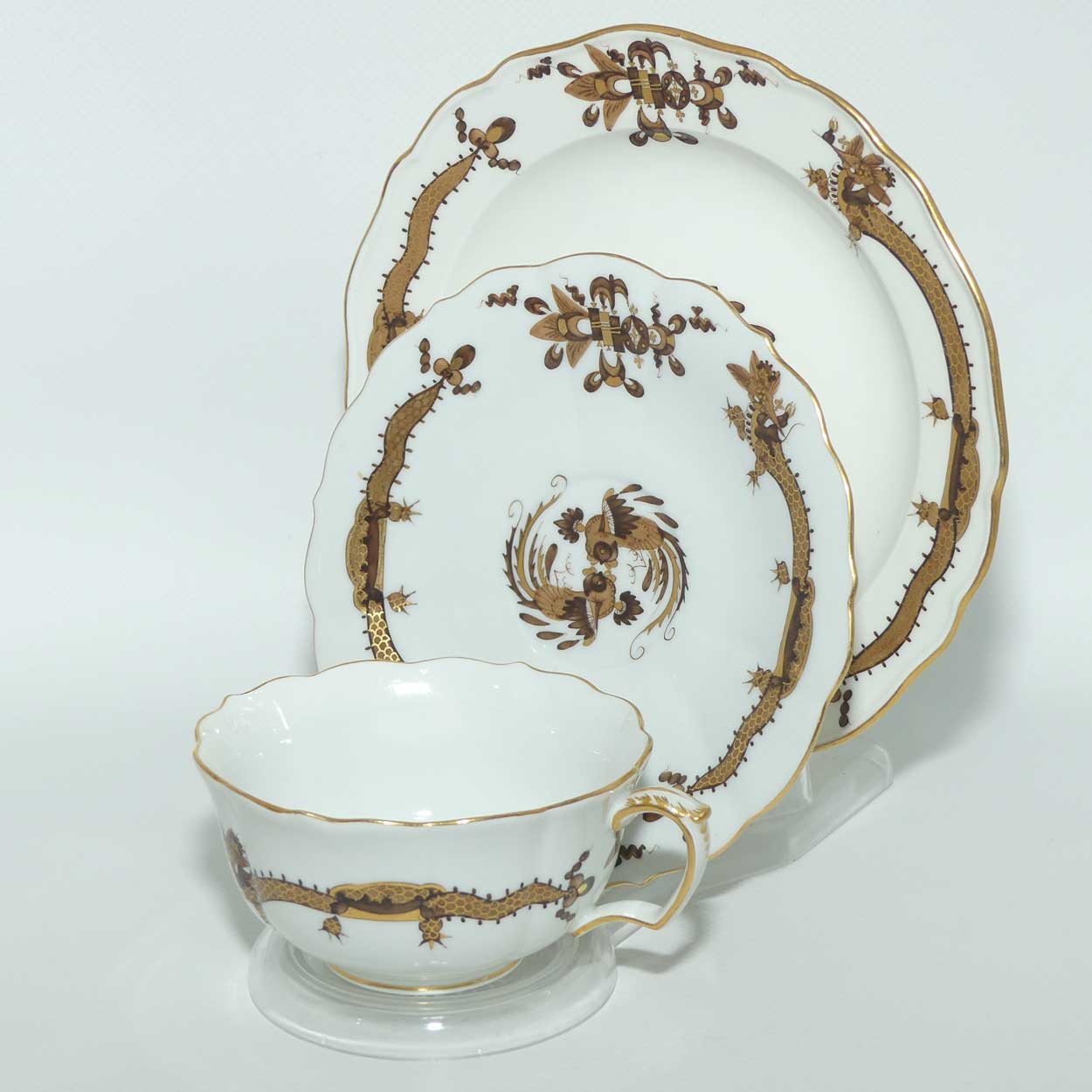 Meissen Brown Dragon tea trio trimmed with gilt