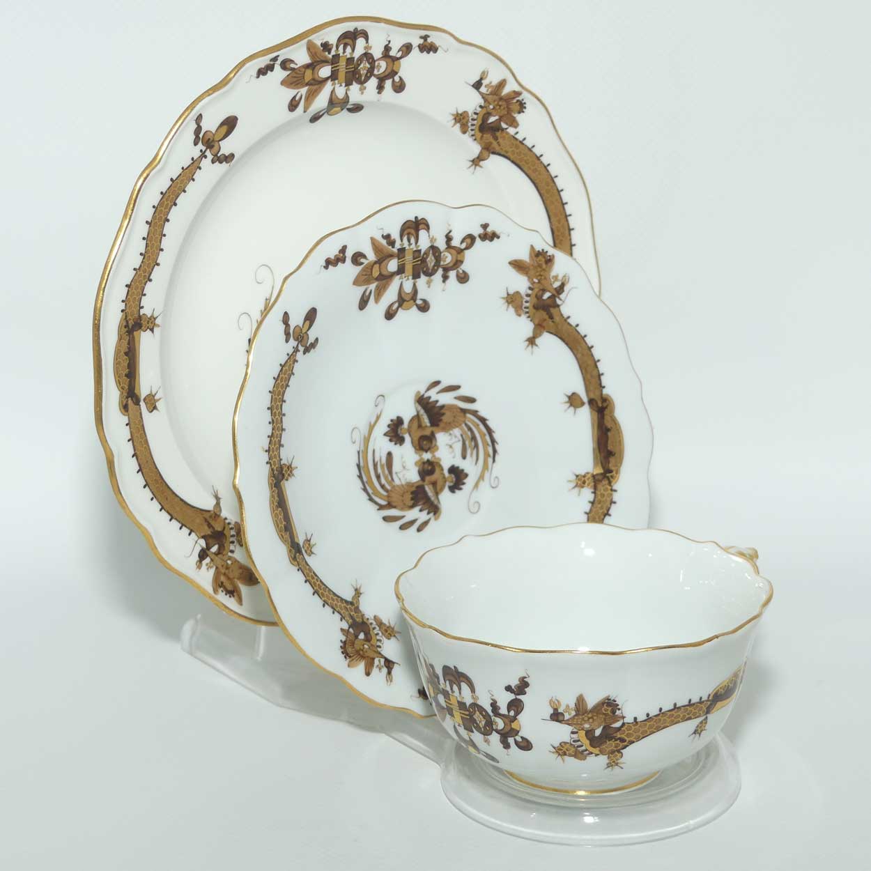 Meissen Brown Dragon tea trio trimmed with gilt