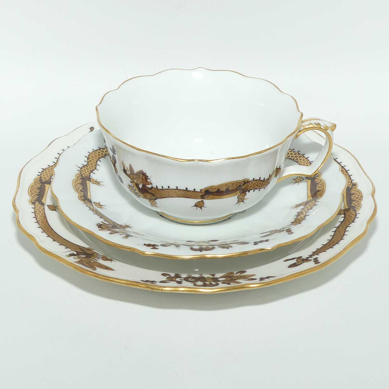 Meissen Brown Dragon tea trio trimmed with gilt