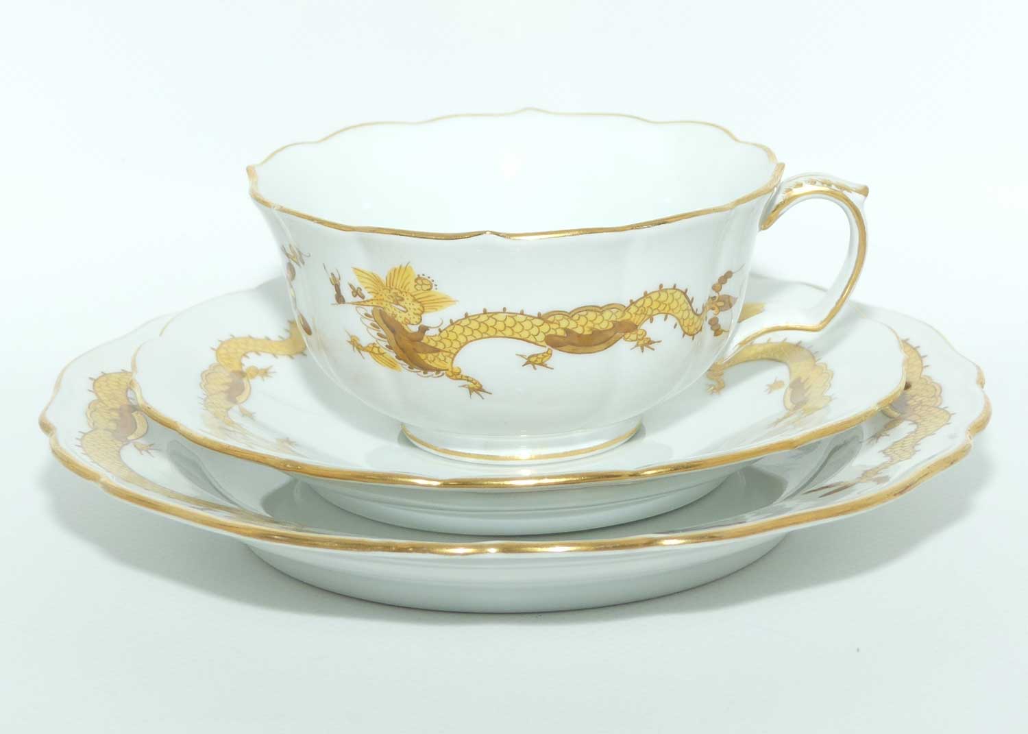 Meissen Yellow Dragon tea trio trimmed with gilt