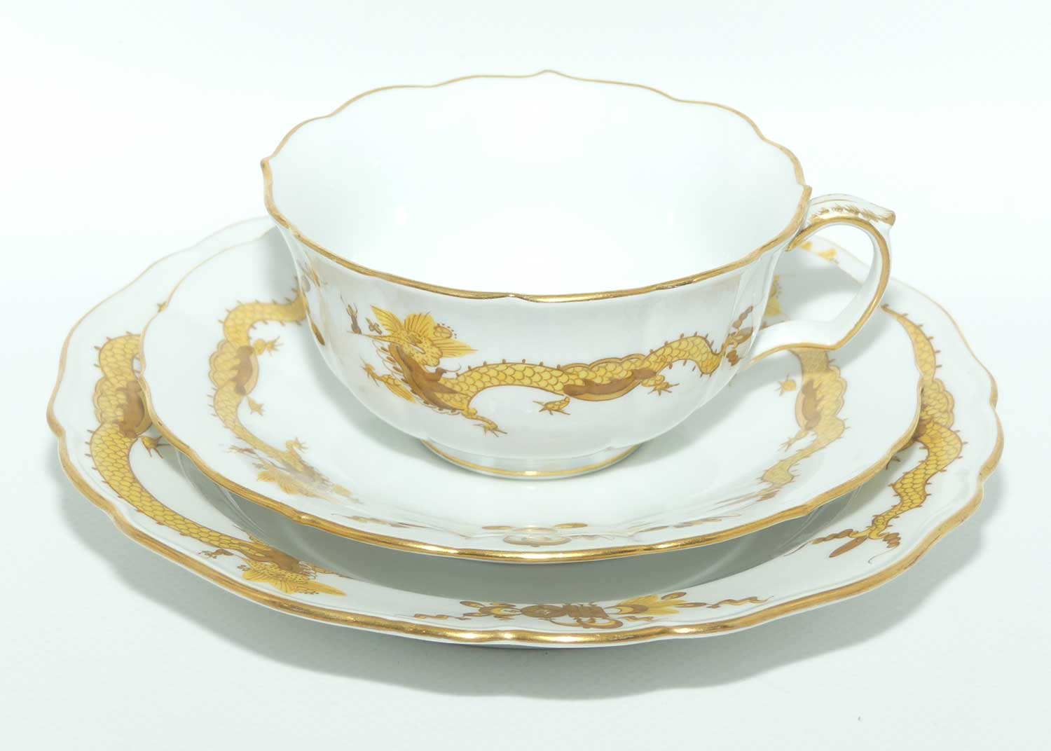 Meissen Yellow Dragon tea trio trimmed with gilt