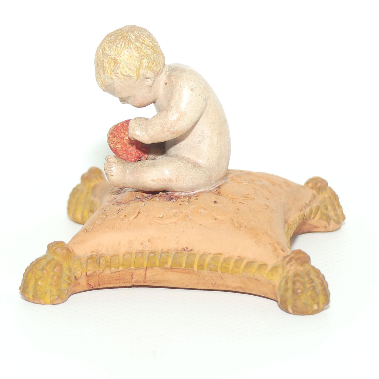 P. Ipsens Eneret terracotta figure of a baby on cushion | 442