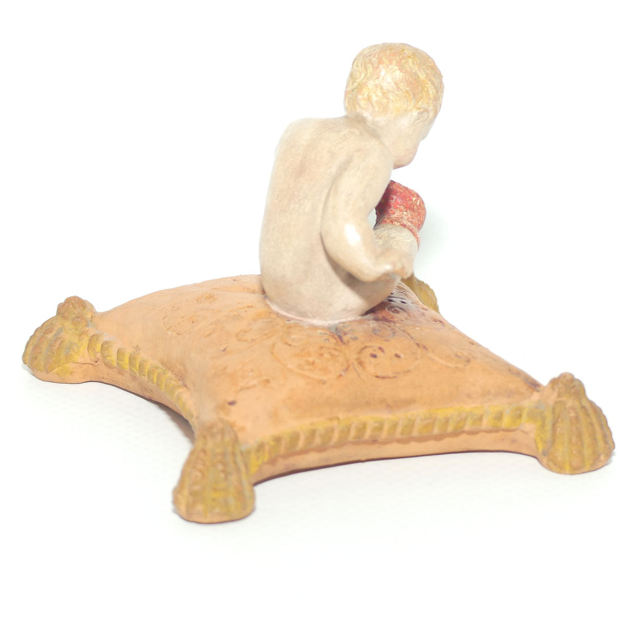 P. Ipsens Eneret terracotta figure of a baby on cushion | 442