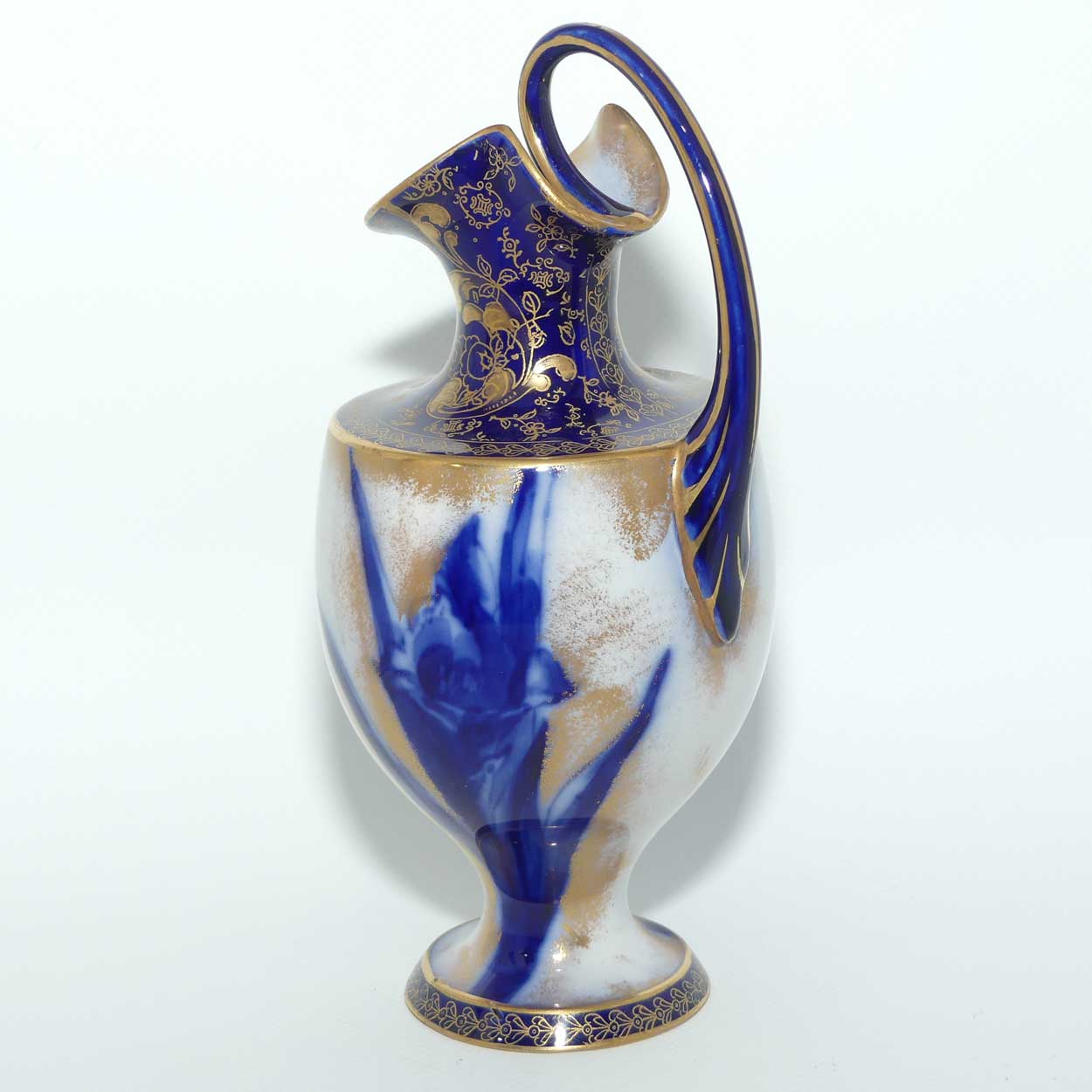 Doulton Burslem Blue Iris and Daffodil loop handle jug with gilt highlights