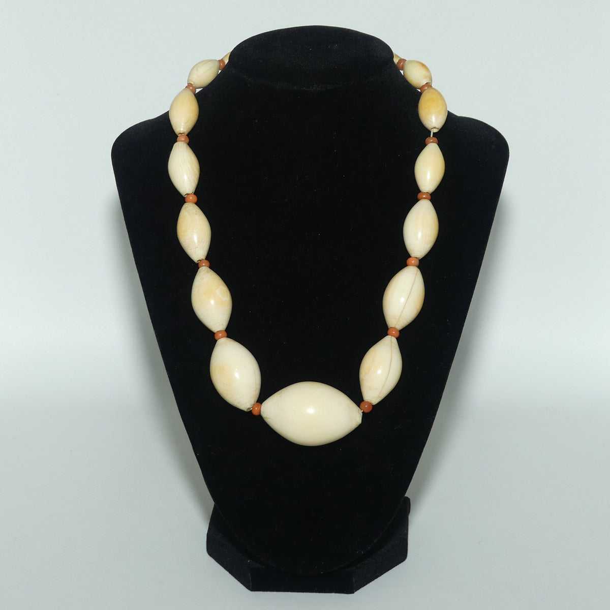 Very Heavy Antique set of Graduated Elongated Ivory Beads with feature Coral beads