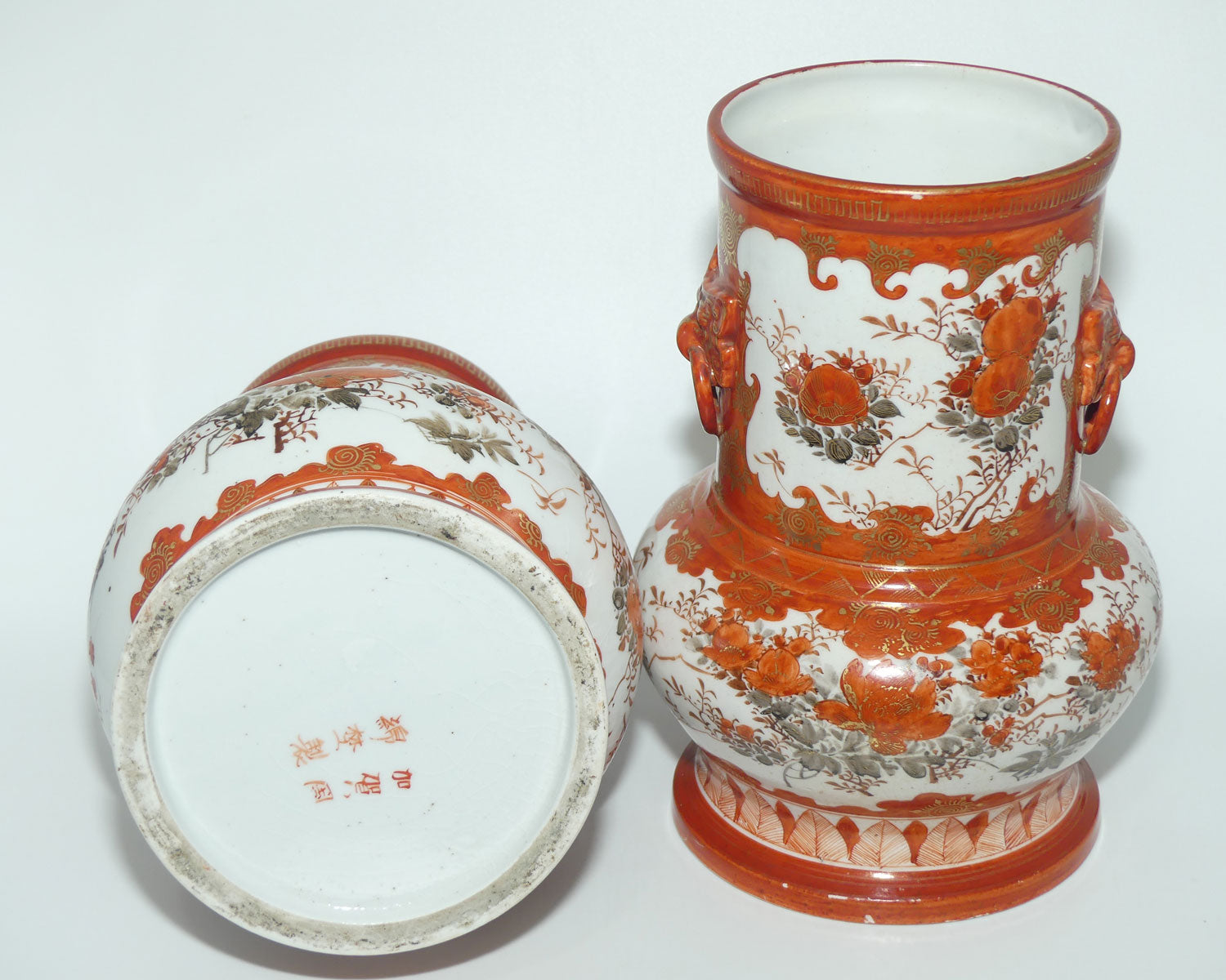 Pair of Japanese Kutani vases | Floral Decoration with figural handles | signed to base