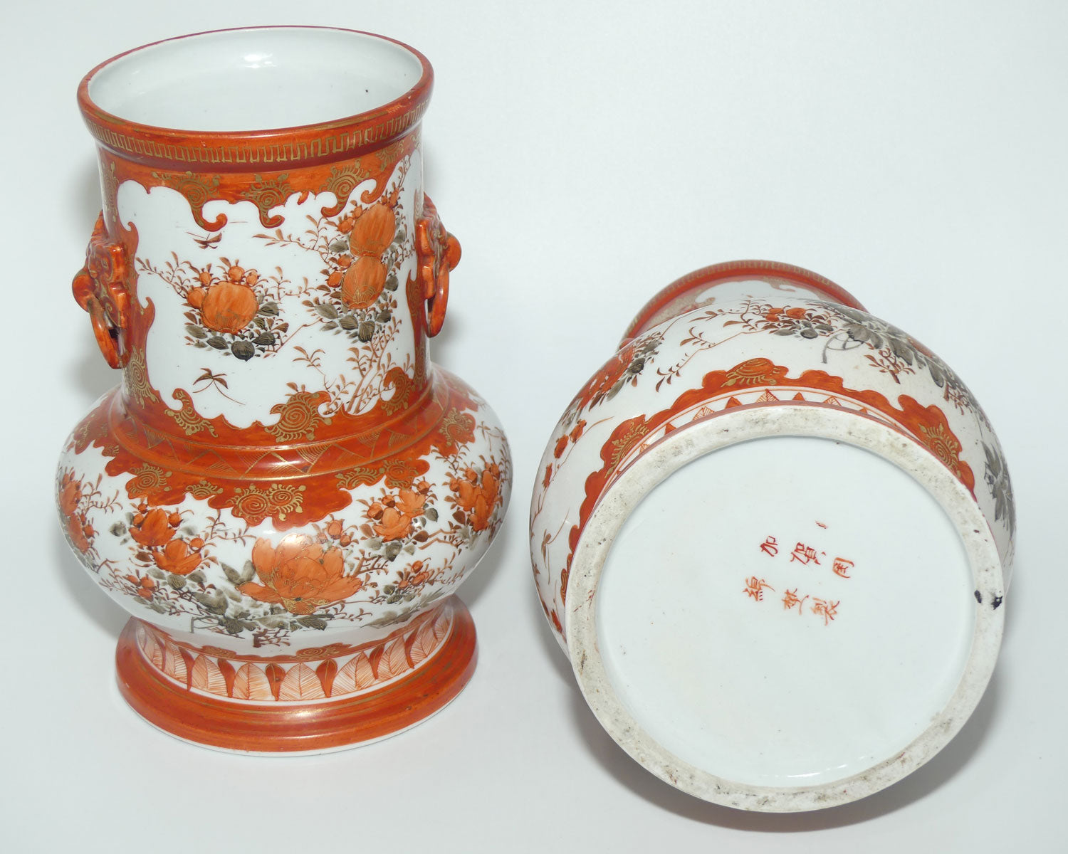 Pair of Japanese Kutani vases | Floral Decoration with figural handles | signed to base