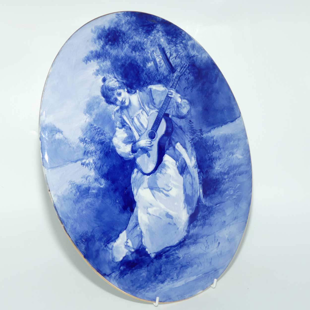 Royal Doulton Blue Childrens large oval wall plaque (Woman playing guitar)