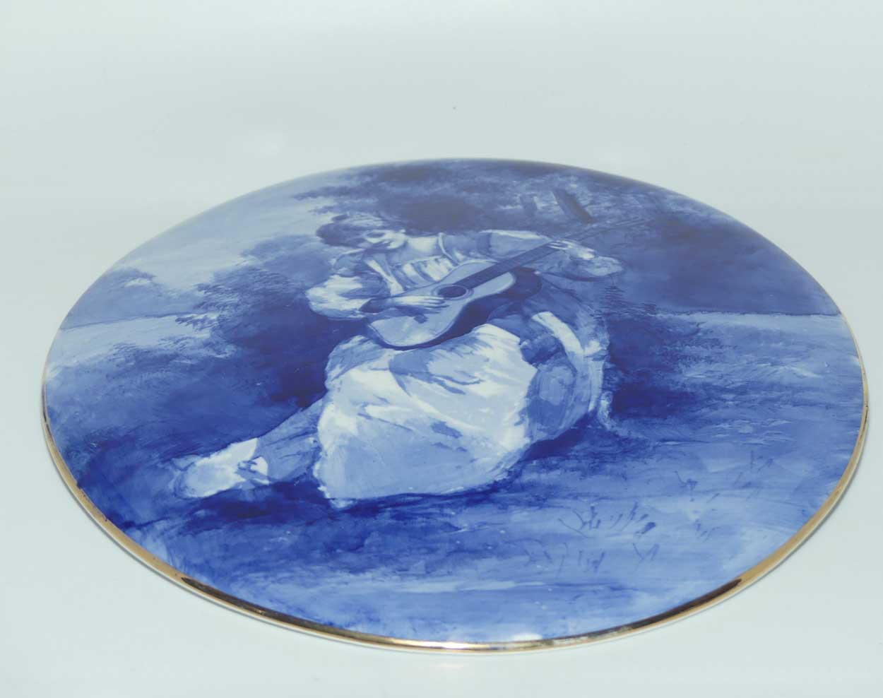 Royal Doulton Blue Childrens large oval wall plaque (Woman playing guitar)
