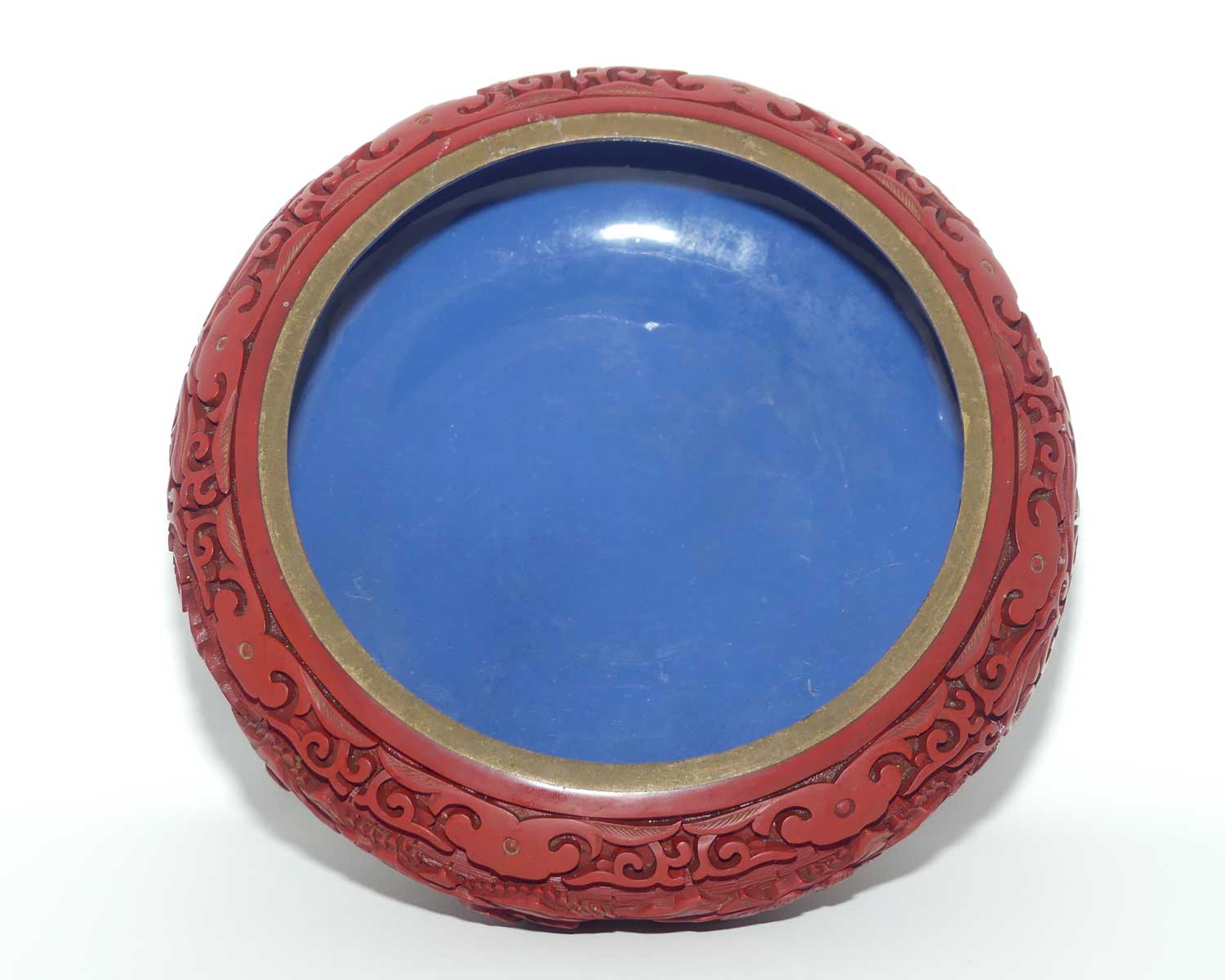 Large early 20th Century Chinese Hand Carved Red Cinnabar bowl with brass surround