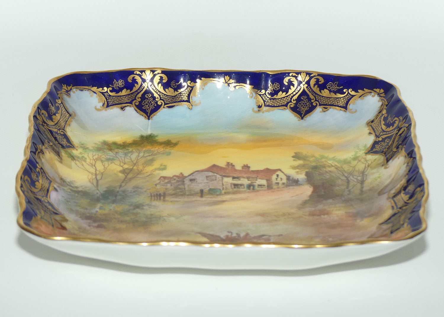 Royal Doulton hand painted and gilt The Leather Bottle Cobham bowl (Hart)