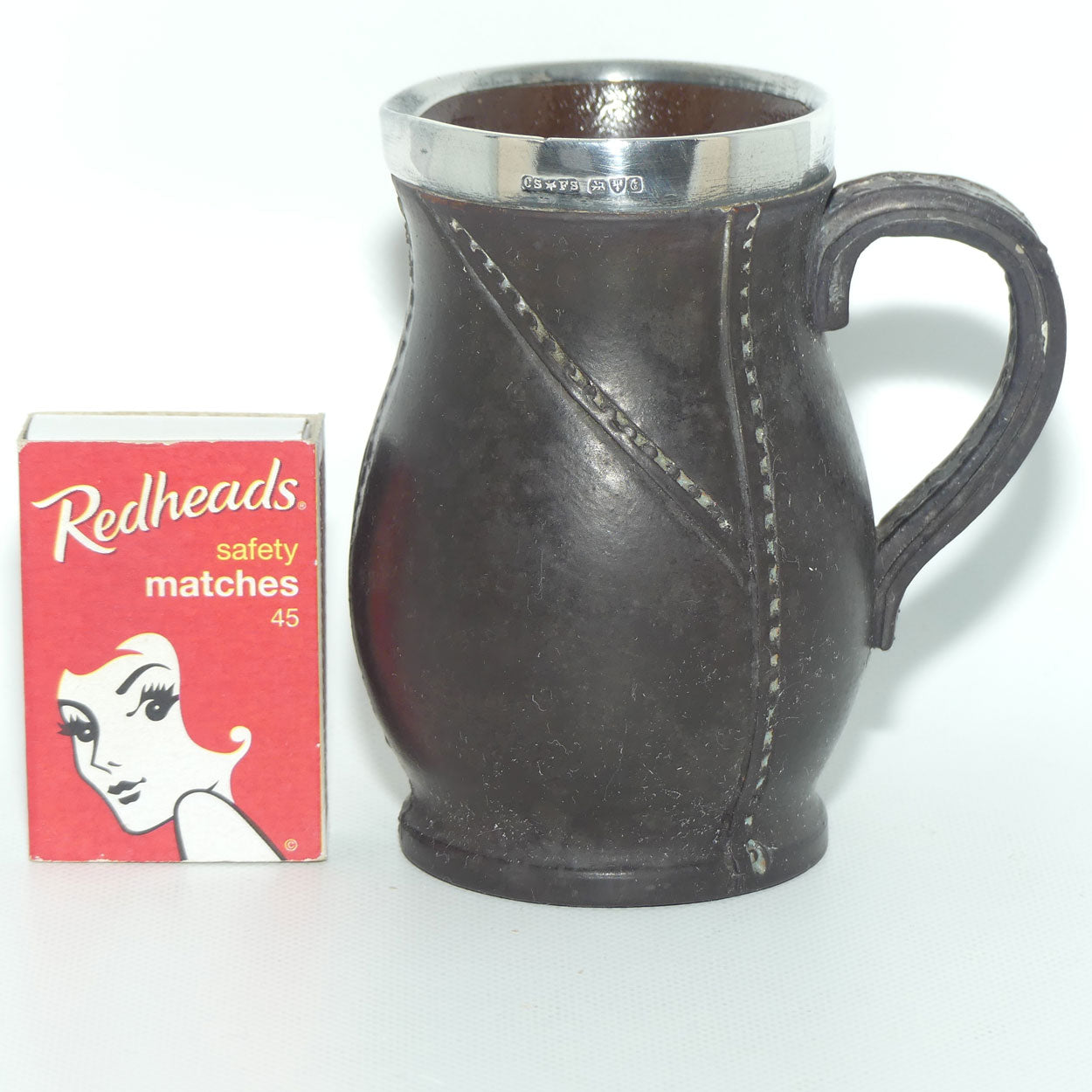 Royal Doulton Leatherware miniature jug with Sterling Silver rim | Chester 1903