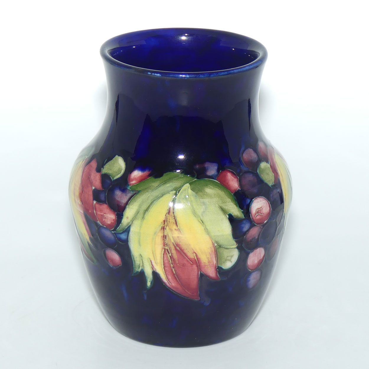 William Moorcroft Leaves and Fruit (Blue) waisted vase