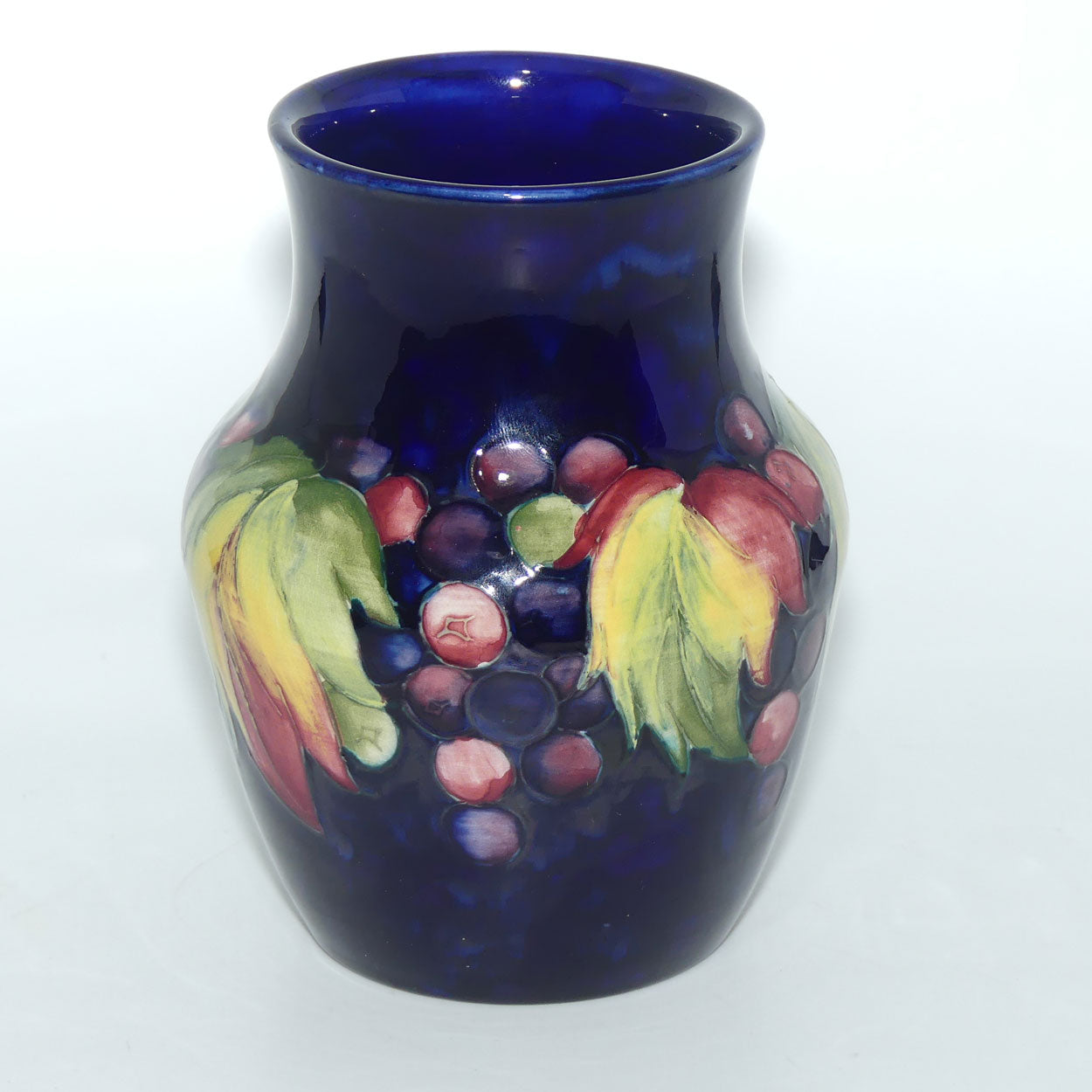 William Moorcroft Leaves and Fruit (Blue) waisted vase