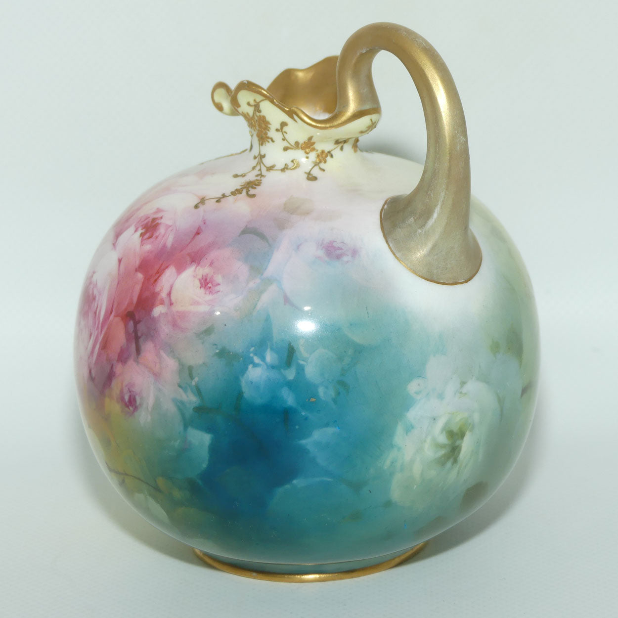 Doulton Burslem England hand painted and gilt floral pattern Luscian Ware round body ewer | H Piper