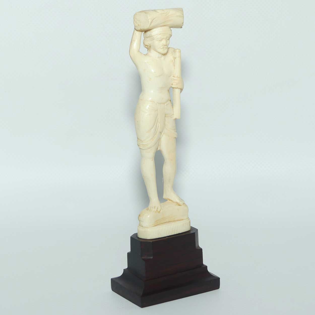 Carved Ivory Figure on Rosewood base | Man with Axe Carrying Log on Head | 17cm