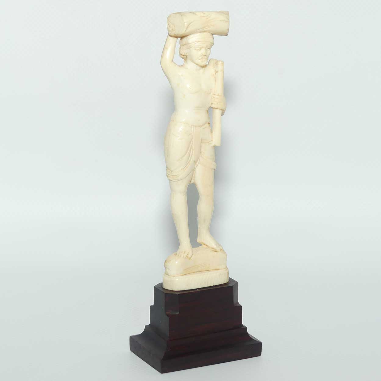 Carved Ivory Figure on Rosewood base | Man with Axe Carrying Log on Head | 17cm