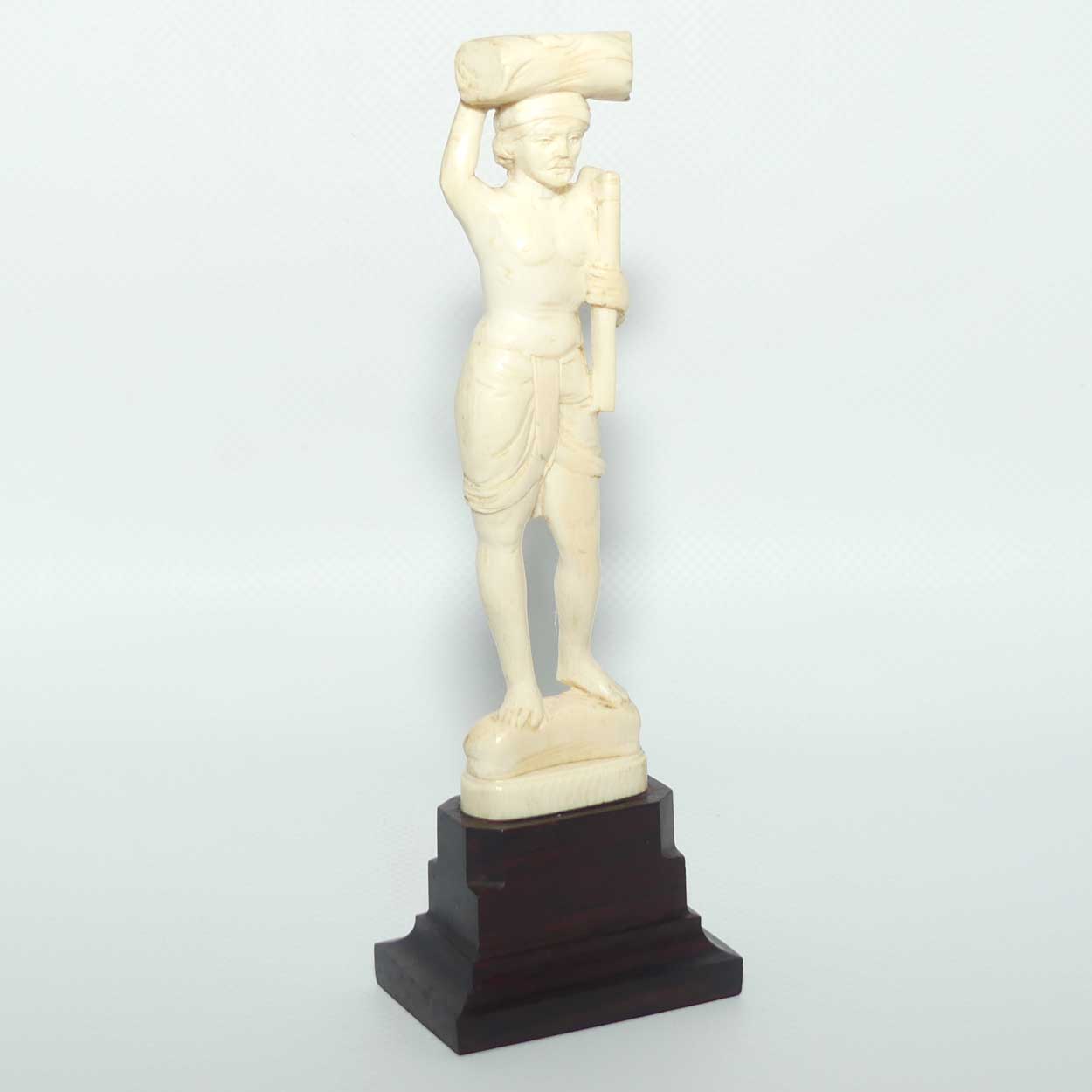 Carved Ivory Figure on Rosewood base | Man with Axe Carrying Log on Head | 17cm