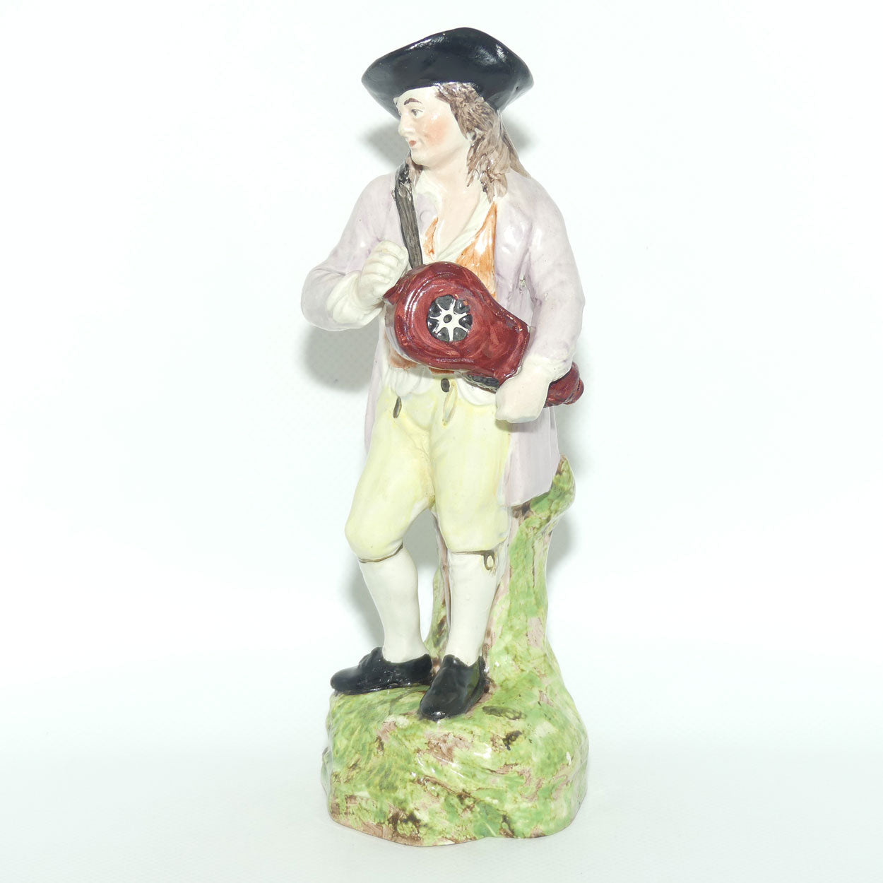 19th Cent English Pottery Man in Hat Carrying Instrument
