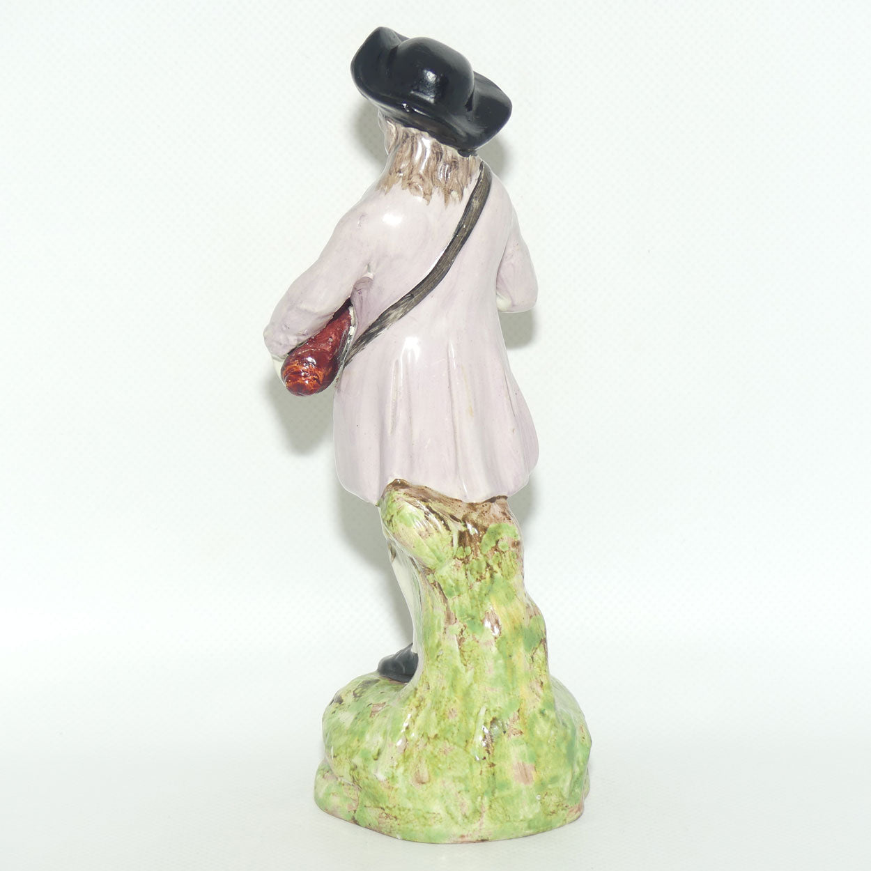 19th Cent English Pottery Man in Hat Carrying Instrument