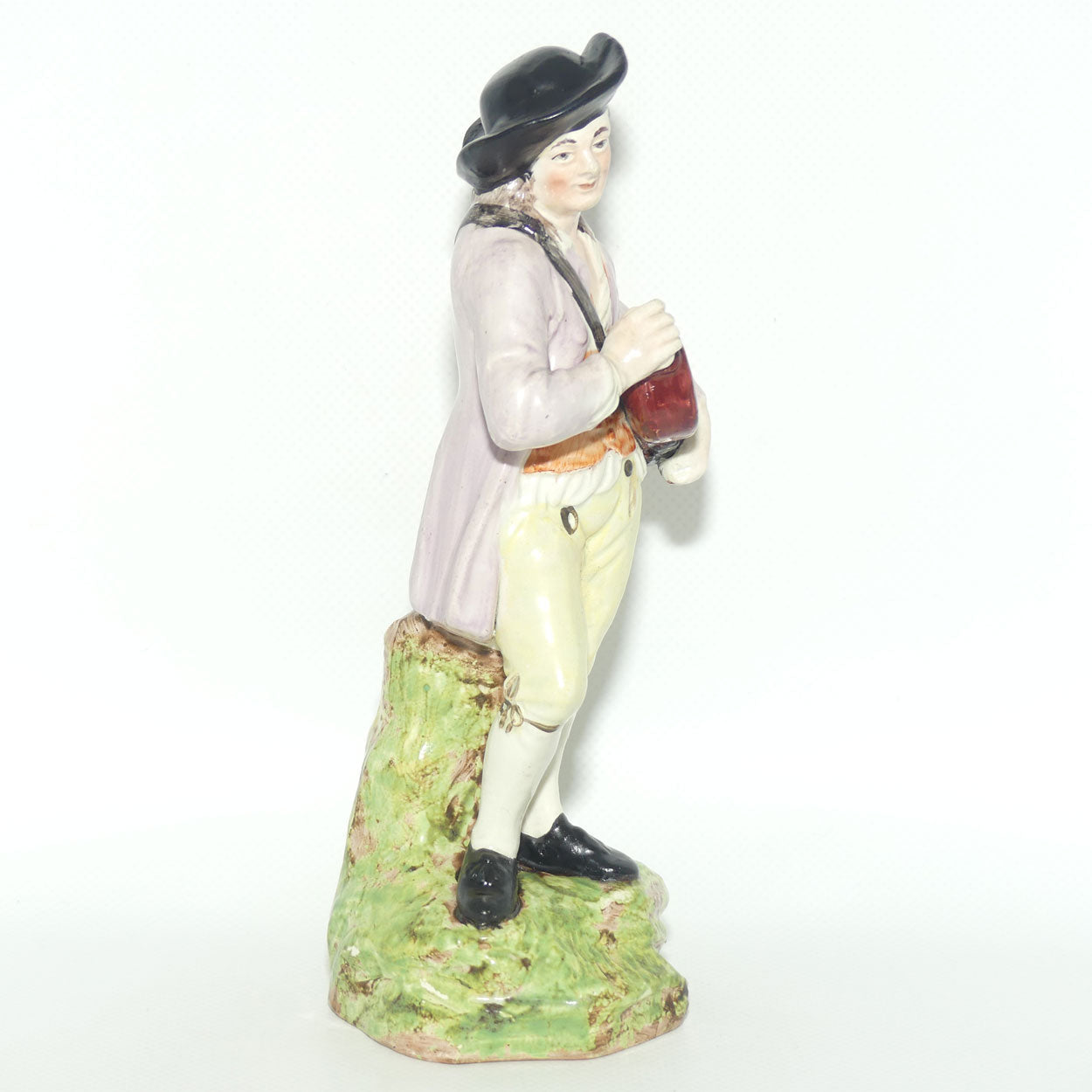19th Cent English Pottery Man in Hat Carrying Instrument