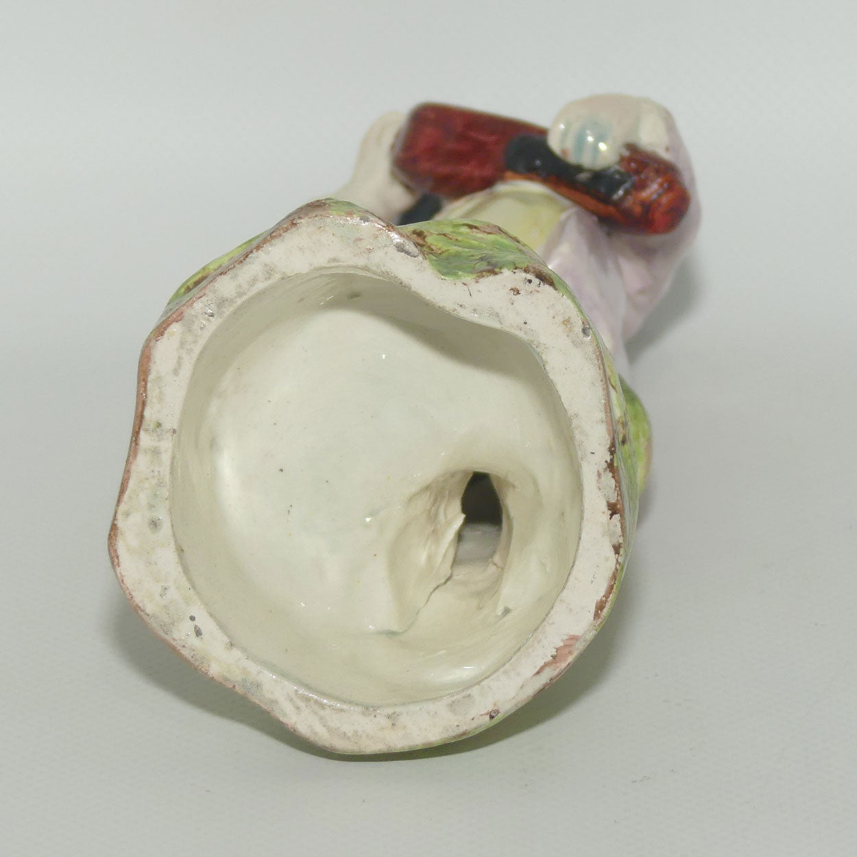19th Cent English Pottery Man in Hat Carrying Instrument