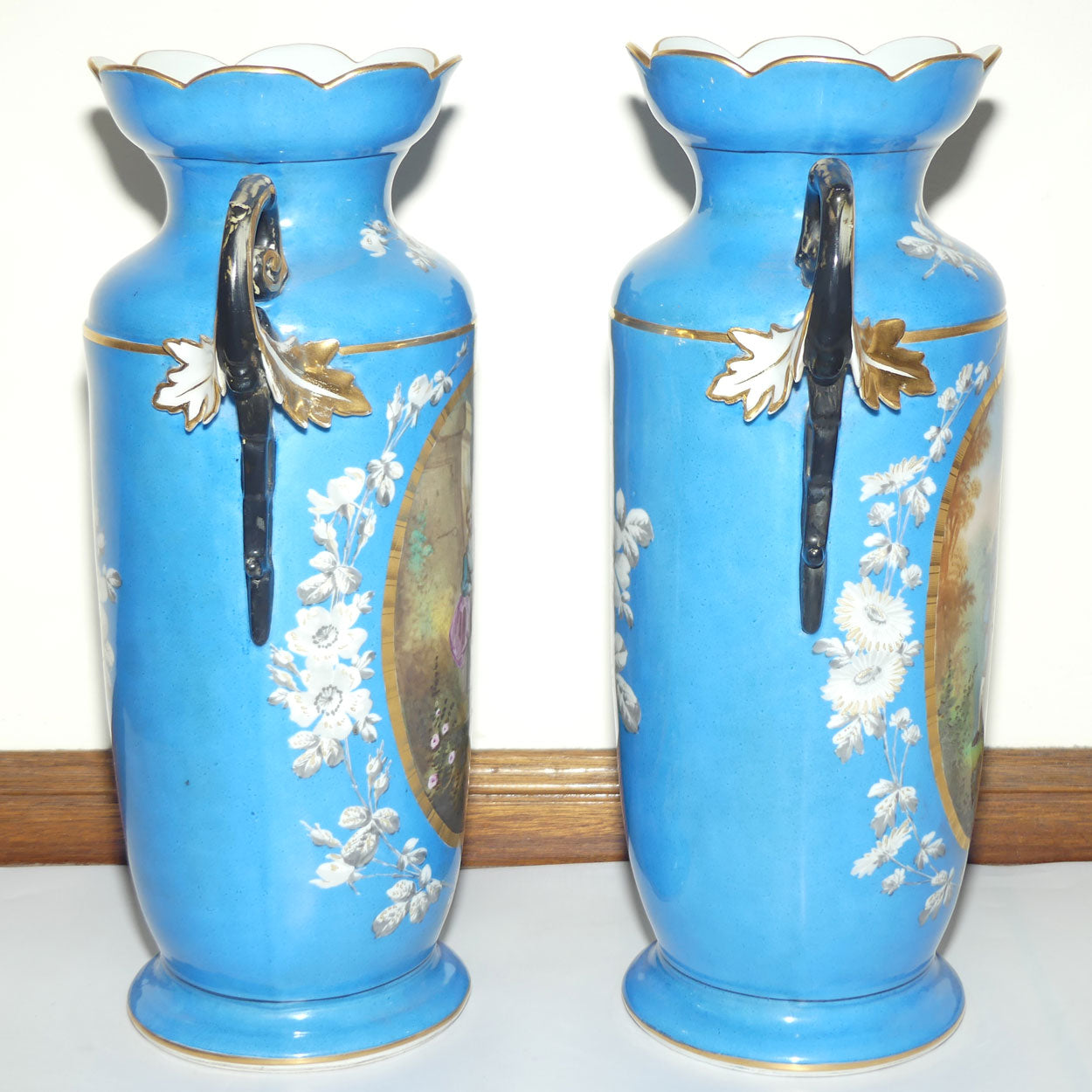 Pair of Continental European mantle vases with courting couple scenes c.1890