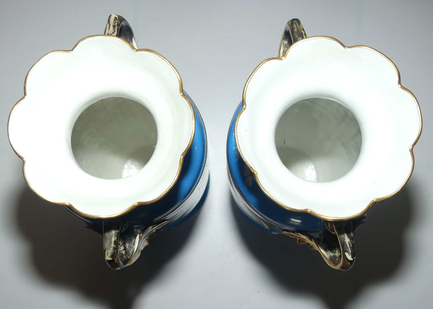 Pair of Continental European mantle vases with courting couple scenes c.1890