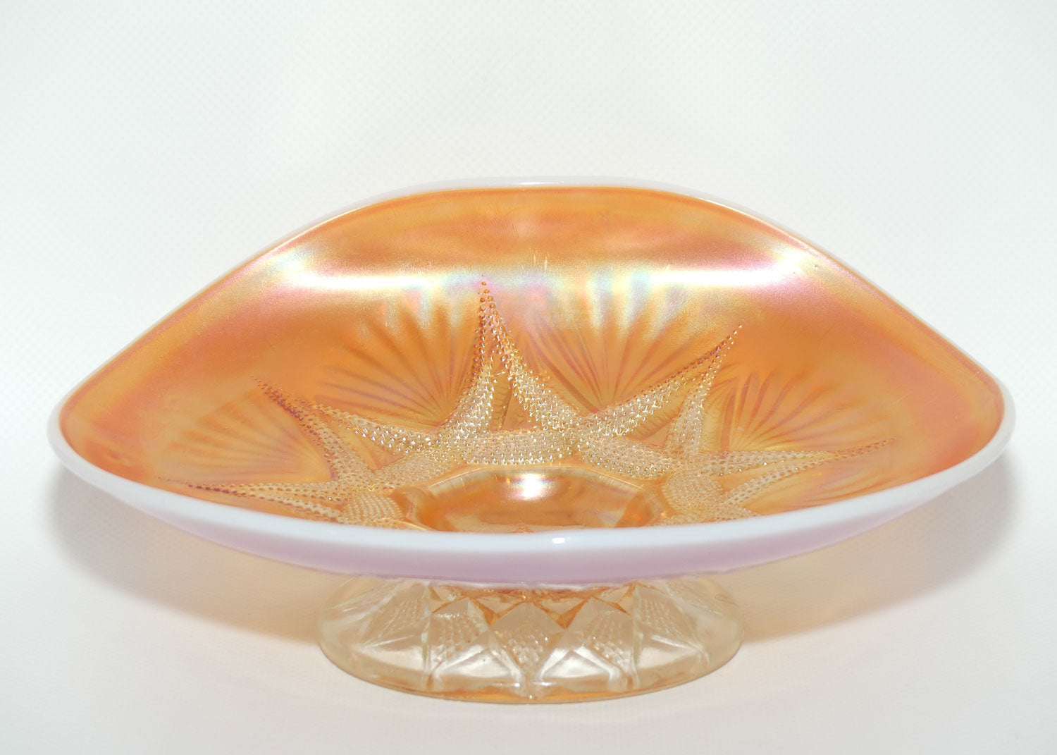 Dugan Carnival Glass | Ski Star pattern | Peach Opalescent colour