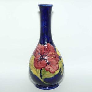 Walter Moorcroft Hibiscus on Blue Ground medium tall tapering vase | Shape 80