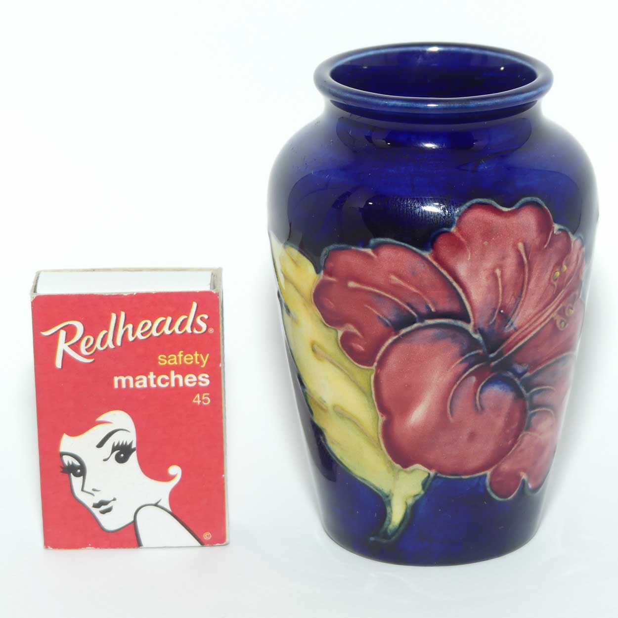 Walter Moorcroft Hibiscus on Blue ground small vase | Original Paper Label to base