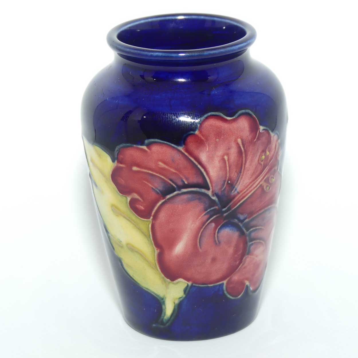 Walter Moorcroft Hibiscus on Blue ground small vase | Original Paper Label to base