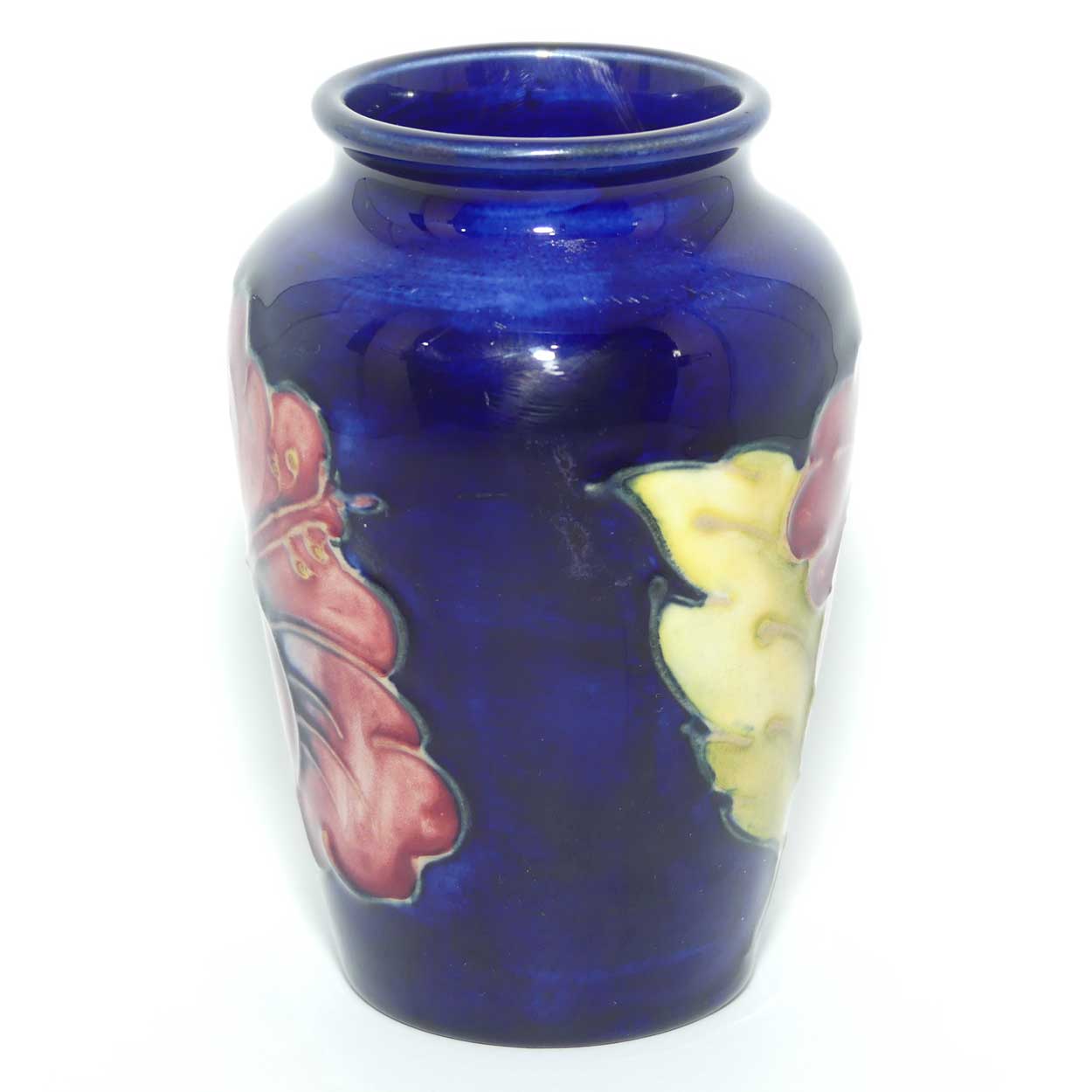 Walter Moorcroft Hibiscus on Blue ground small vase | Original Paper Label to base