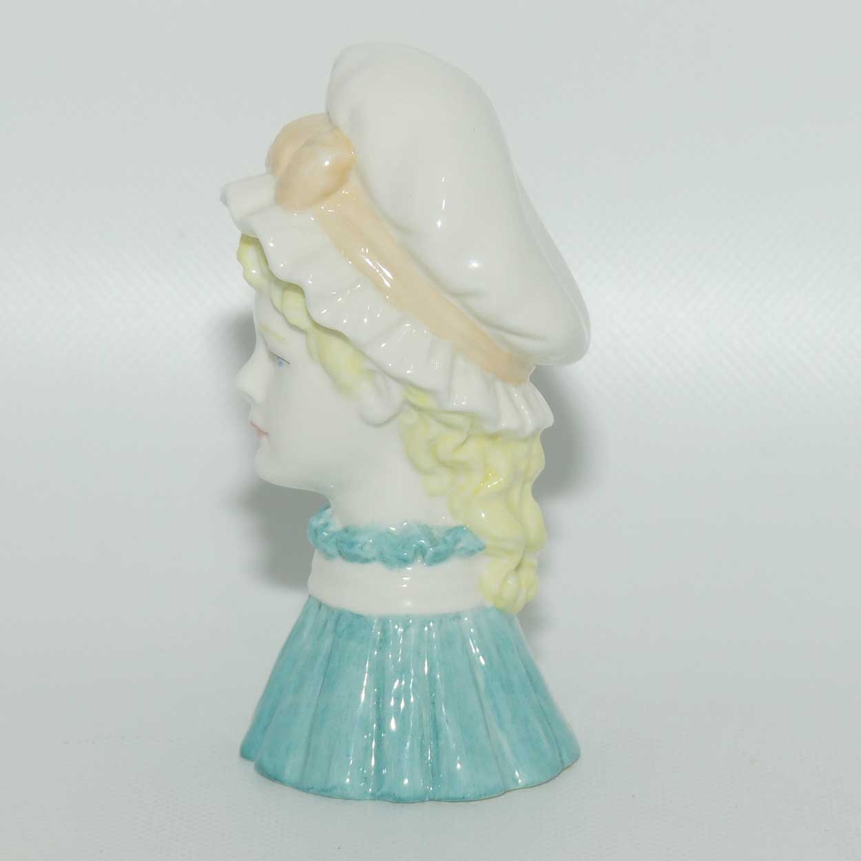 Royal Worcester candle snuffer Mob Cap