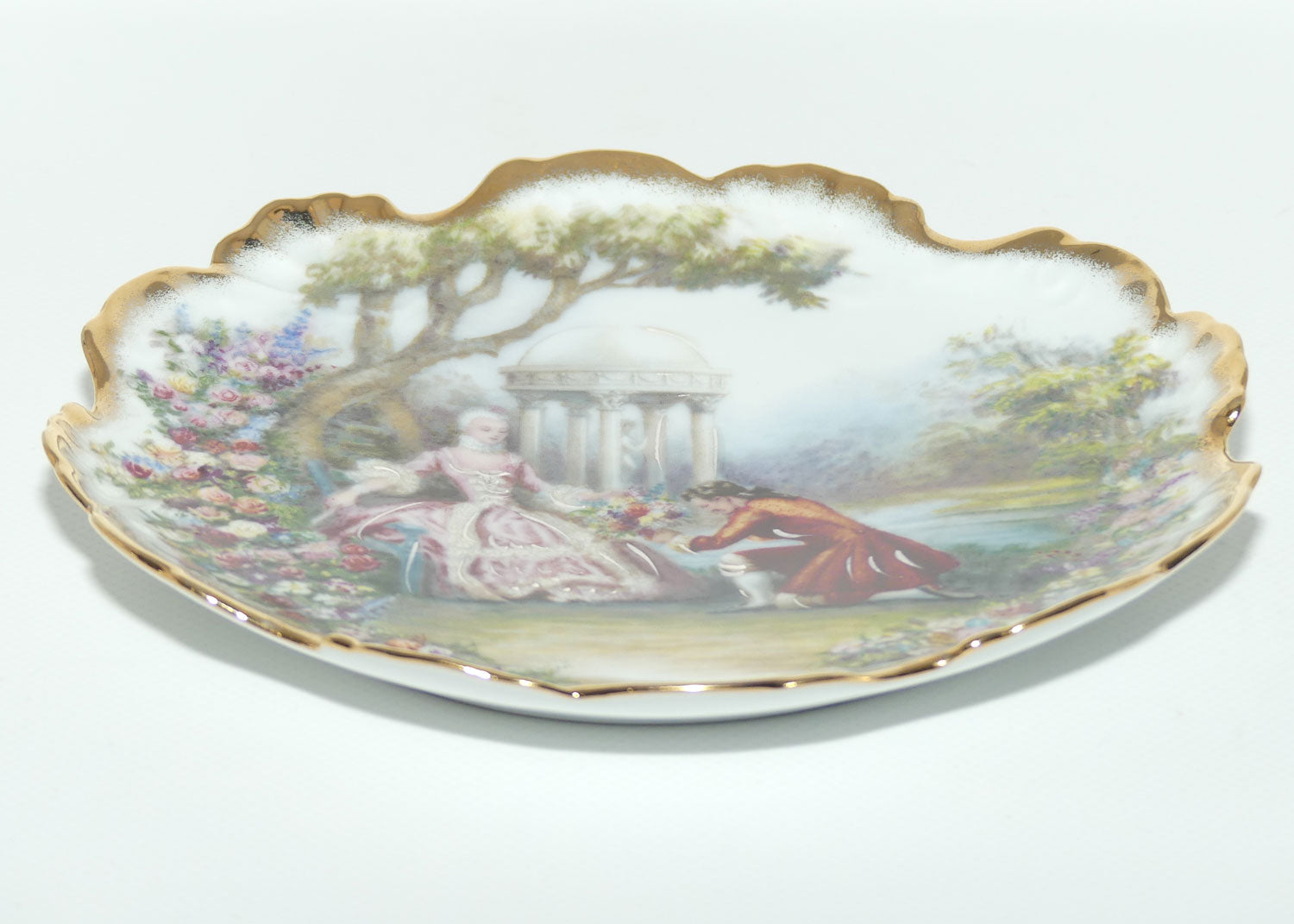 Monarch Porcelaine dÁrt Limoges France Courting Couple plate | White and Gilt | 18.5cm