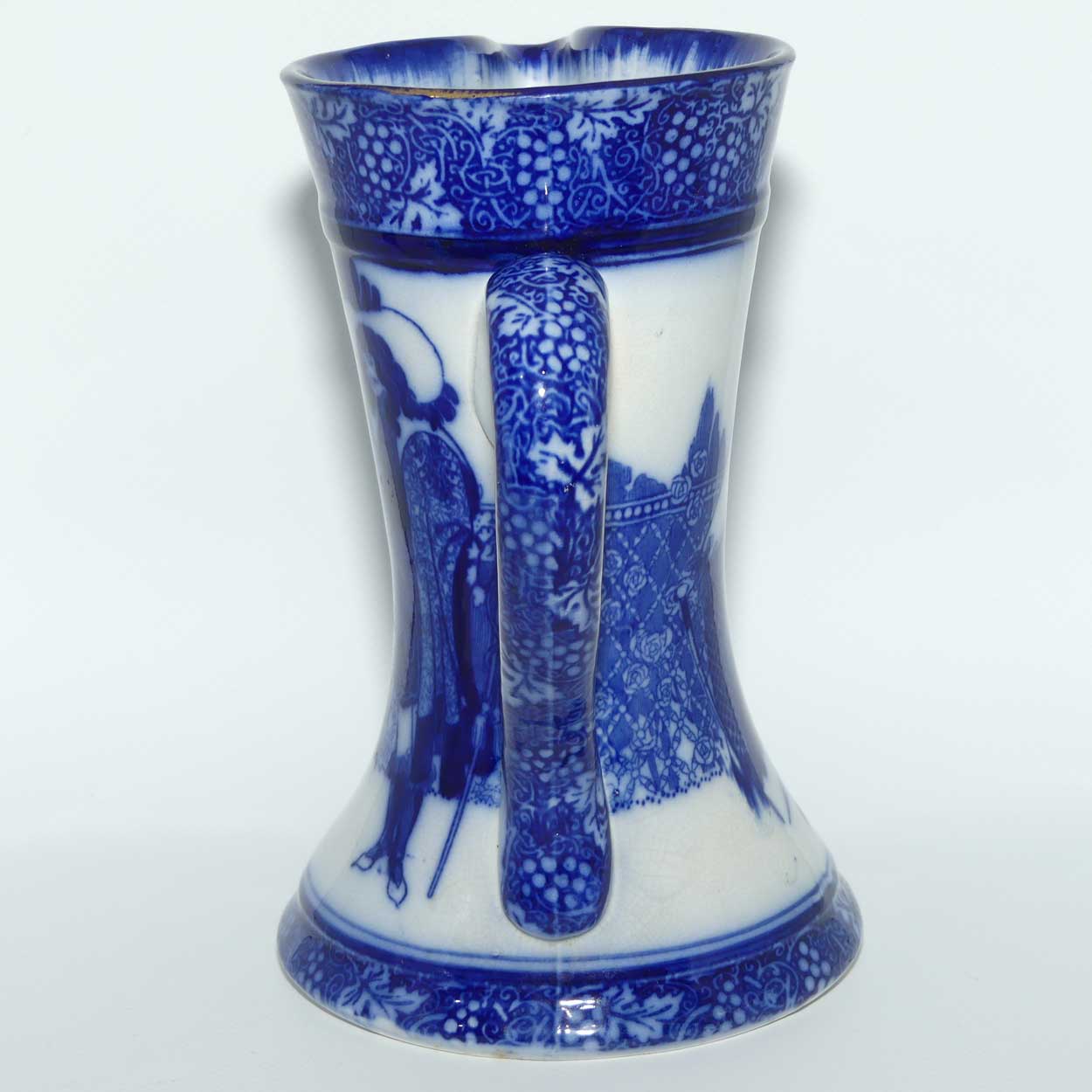 Royal Doulton Morrisian Flow Blue WH Bradley Eastern Figures Tudor shape jug