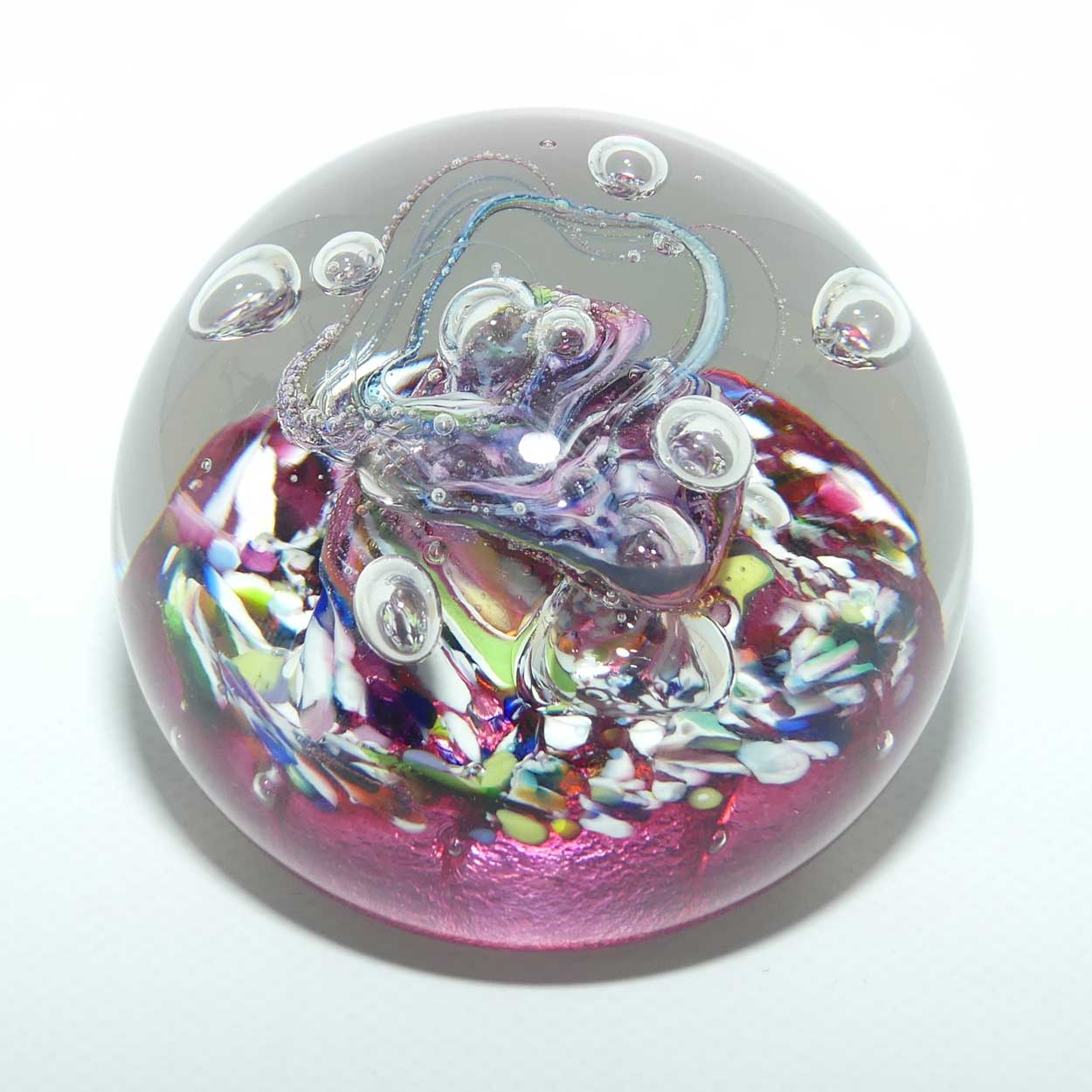 Caithness Glass Myriad design Controlled Bubble Magnum paperweight | Cranberry
