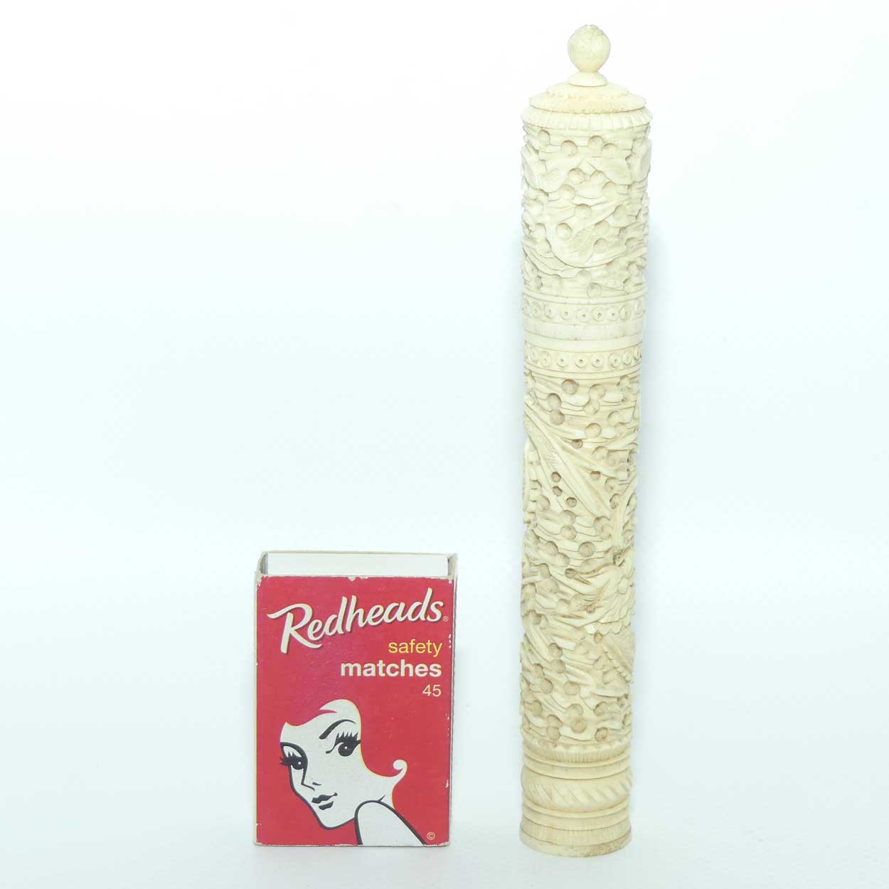 Chinese Carved Ivory needle case containing numerous counters