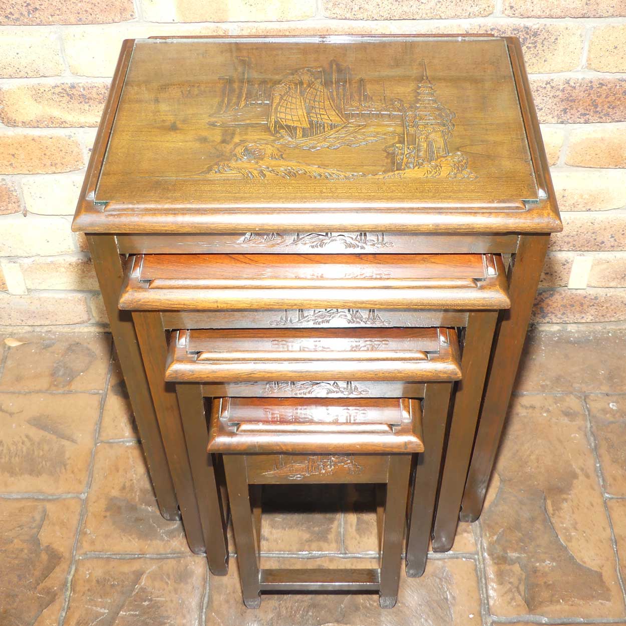 Chinese Carved Nest of 4 Occasional tables with Glass tops