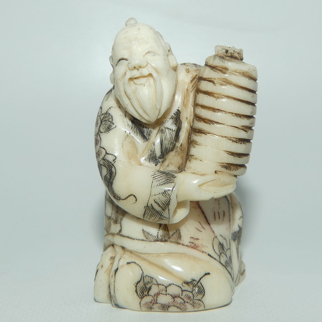 Japanese Carved Bone Netsuke | Old Man holding Lantern