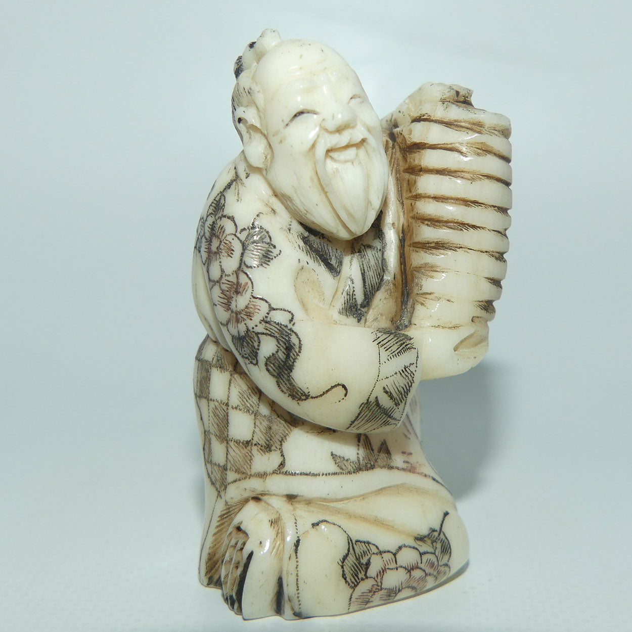 Japanese Carved Bone Netsuke | Old Man holding Lantern