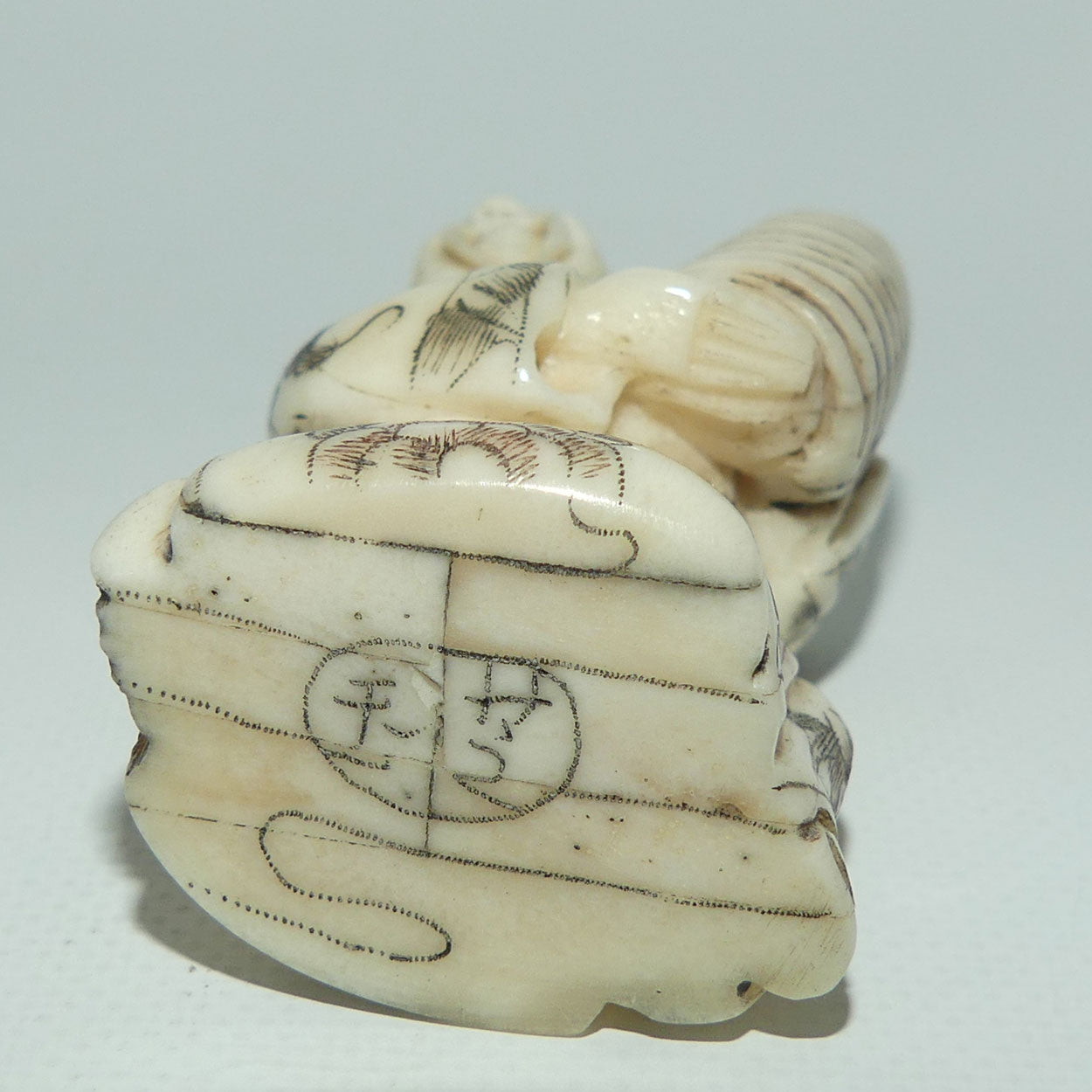 Japanese Carved Bone Netsuke | Old Man holding Lantern