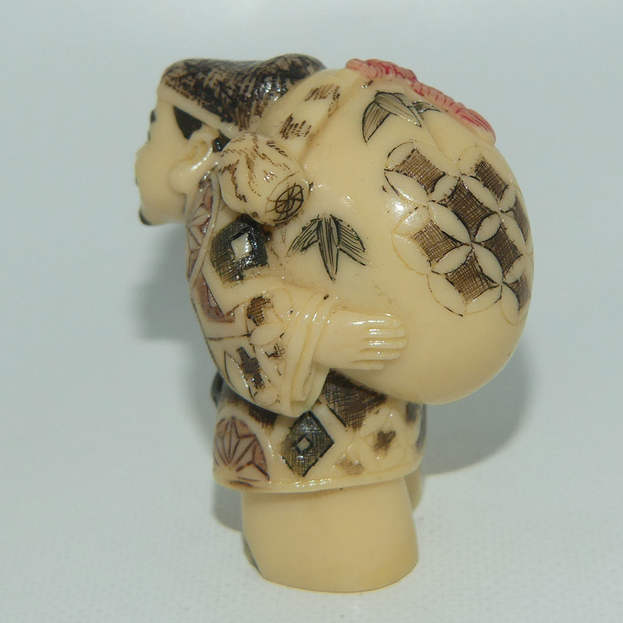 Vintage Japanese Carved Resin Netsuke | Man Carrying Sack