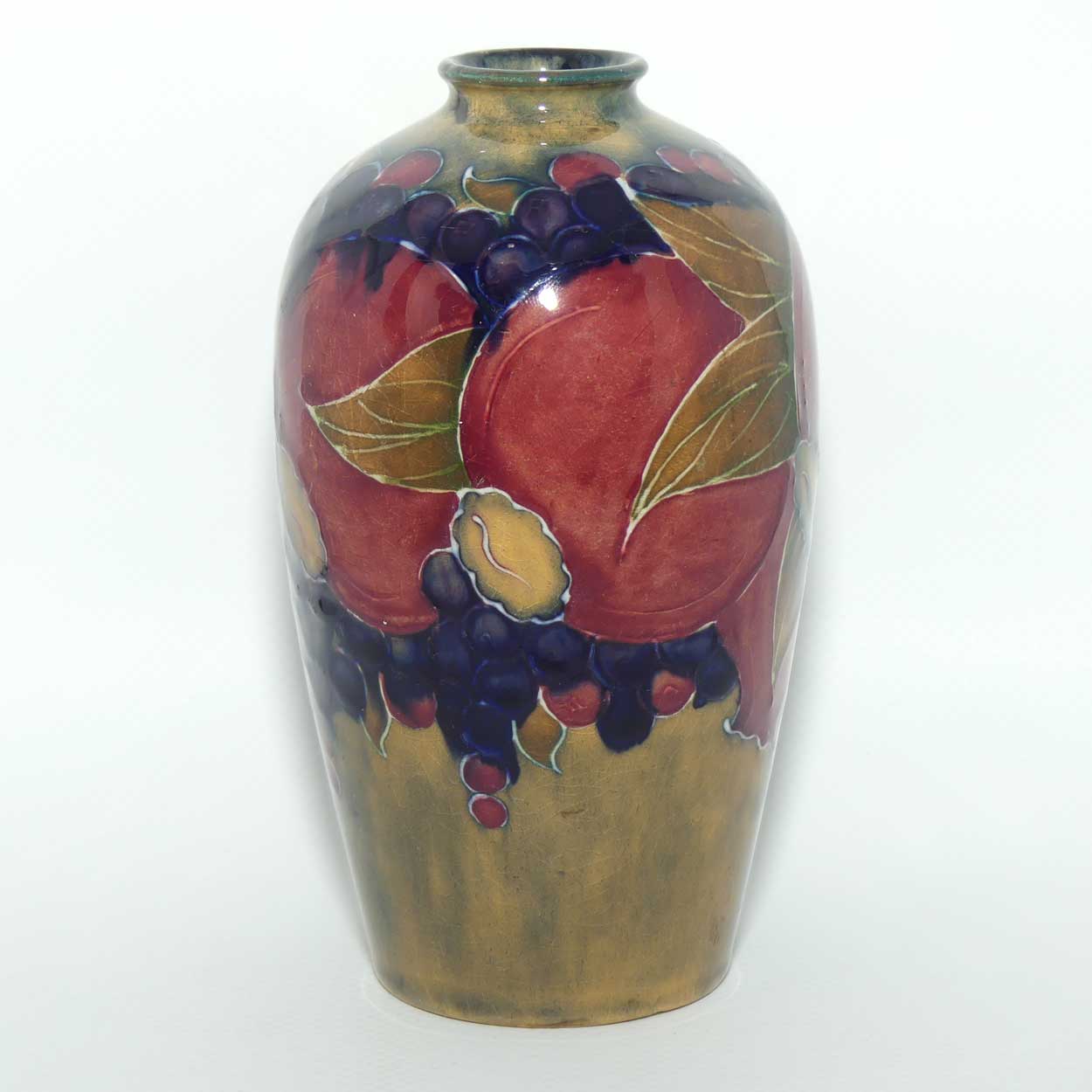 William Moorcroft Pomegranate vase | Early Ochre Ground